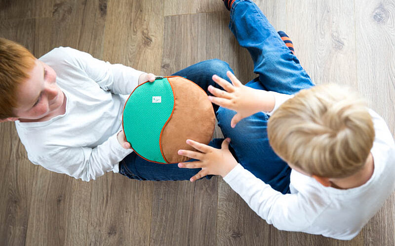 inmuDance-Musiktherapie-Kinderhilfsmittel-FiNiFuchs-Koerperwahnehmung